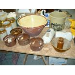 A Large glazed stoneware bowl, stoneware storage pots, salt glazed pots an covers,