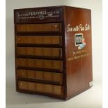 An original advertising 'Perivale' sewing cabinet Of tall rectangular form,