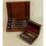 A mahogany cased set of glass Sikes Hydrometers Together with a further smaller cased Sikes