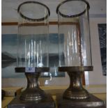 Two contemporary white metal and glass large sized candle holders.