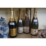 Four bottles of champagne to include Moet Chandon.