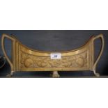 A highly decorative Art Nouveau brass planter having repousse decoration depicting fruit.