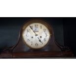 An early 20th Century mahogany veneered Napolean's hat mantel clock.