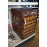 An original advertising 'Perivale' sewing cabinet Of tall rectangular form,