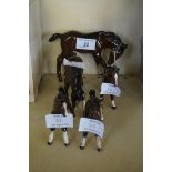 Five assorted Royal Doulton and Beswick bay pony and foal figures.