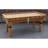 A contemporary Hamilton maple quarter sized American pool table Having black applied studded