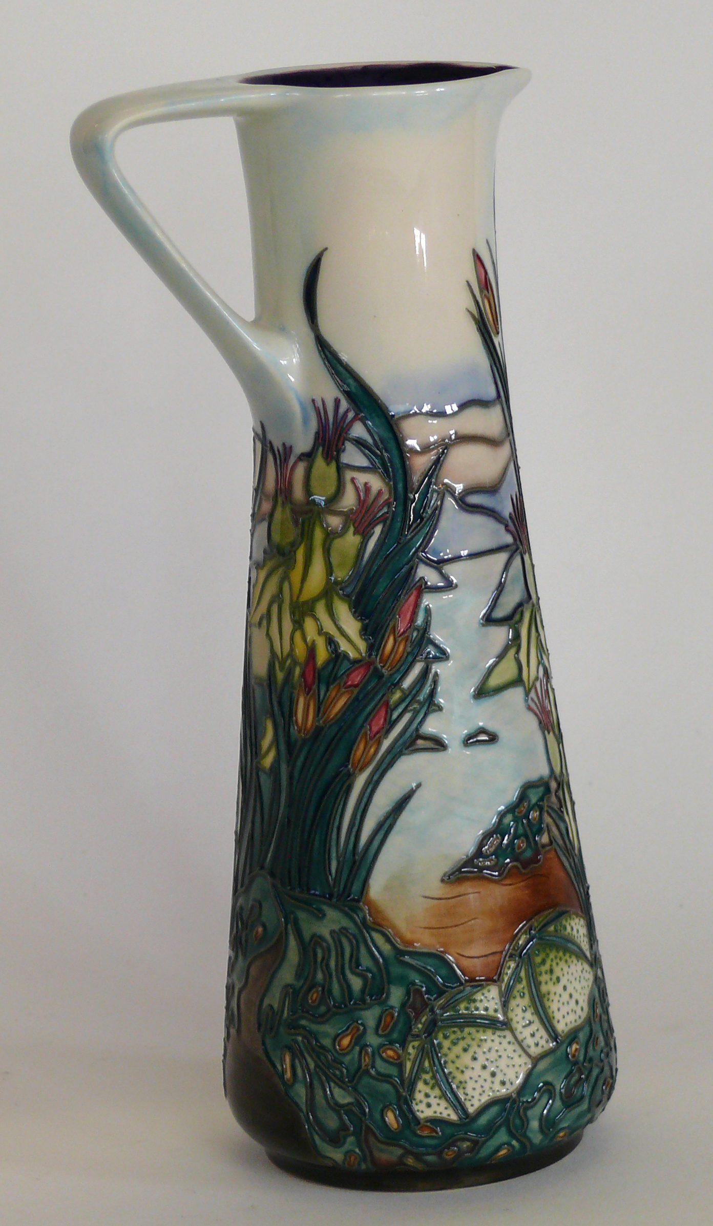 A modern Moorcroft pottery jug of tapering cylindrical form Decorated in the Islay pattern,