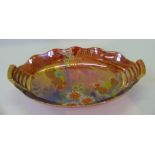 An Art Deco Carlton Ware twin handled lustre bowl 'Fighting Cocks' pattern on an orange lustre