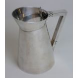 A Walker & Hall Art Deco silver-plated hot water jug With angular side handle,