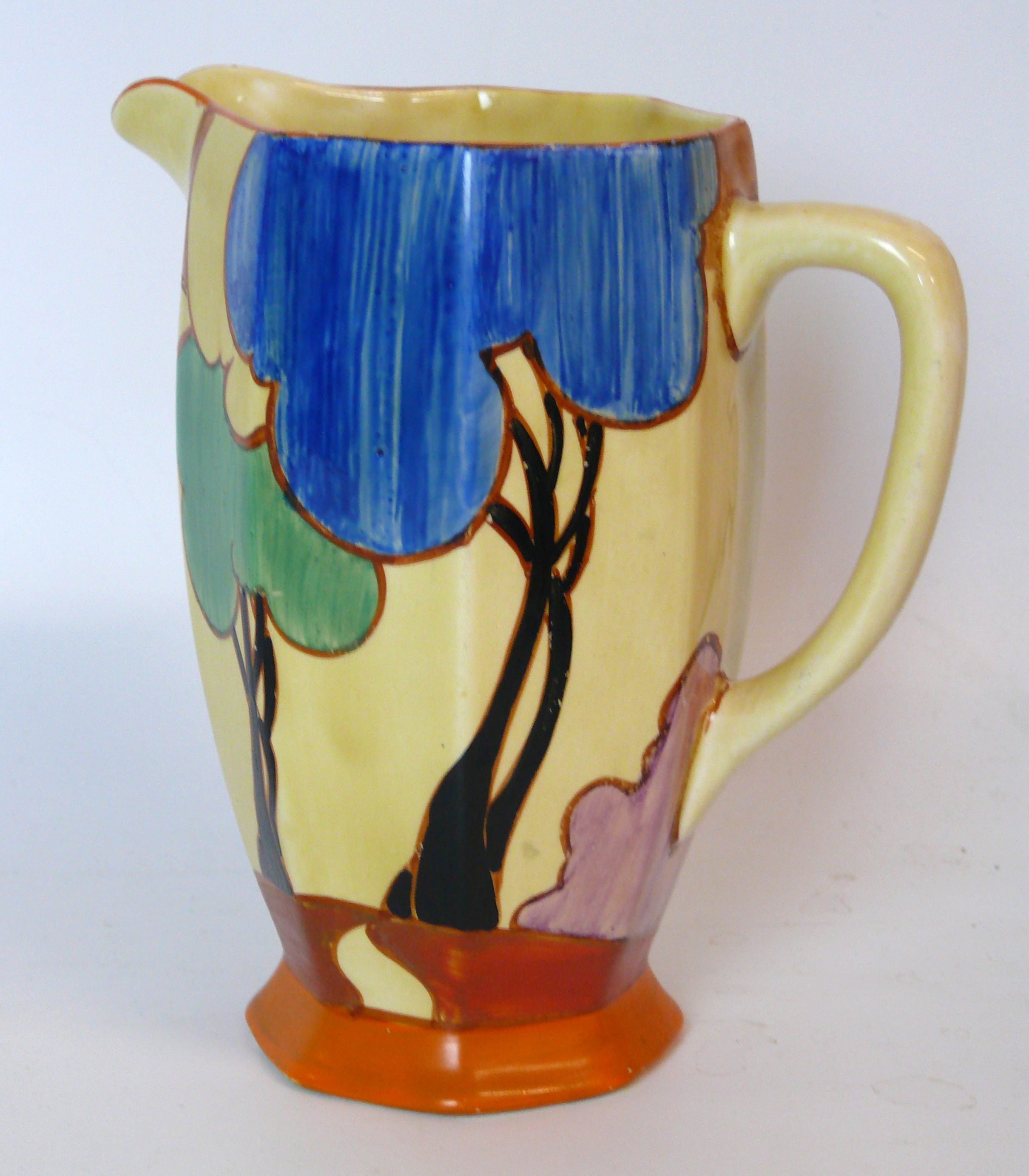 A Clarice Cliff Fantasque Bizarre jug of octagonal form Decorated in the 'Autumn Balloons' pattern,
