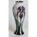 A modern Moorcroft pottery vase of inverted baluster form Decorated with stylised flowers on an