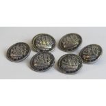 A set of six Edward VII hallmarked silver buttons Each having cast decoration depicting Galleons,