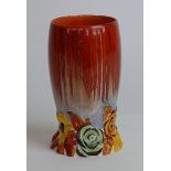A Clarice Cliff vase of cylindrical form Decorated in the 'My Garden' pattern on a dripped red and