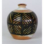 A Poole pottery 'Atlantis' range vase of bulbous form Having painted geometric decoration on a