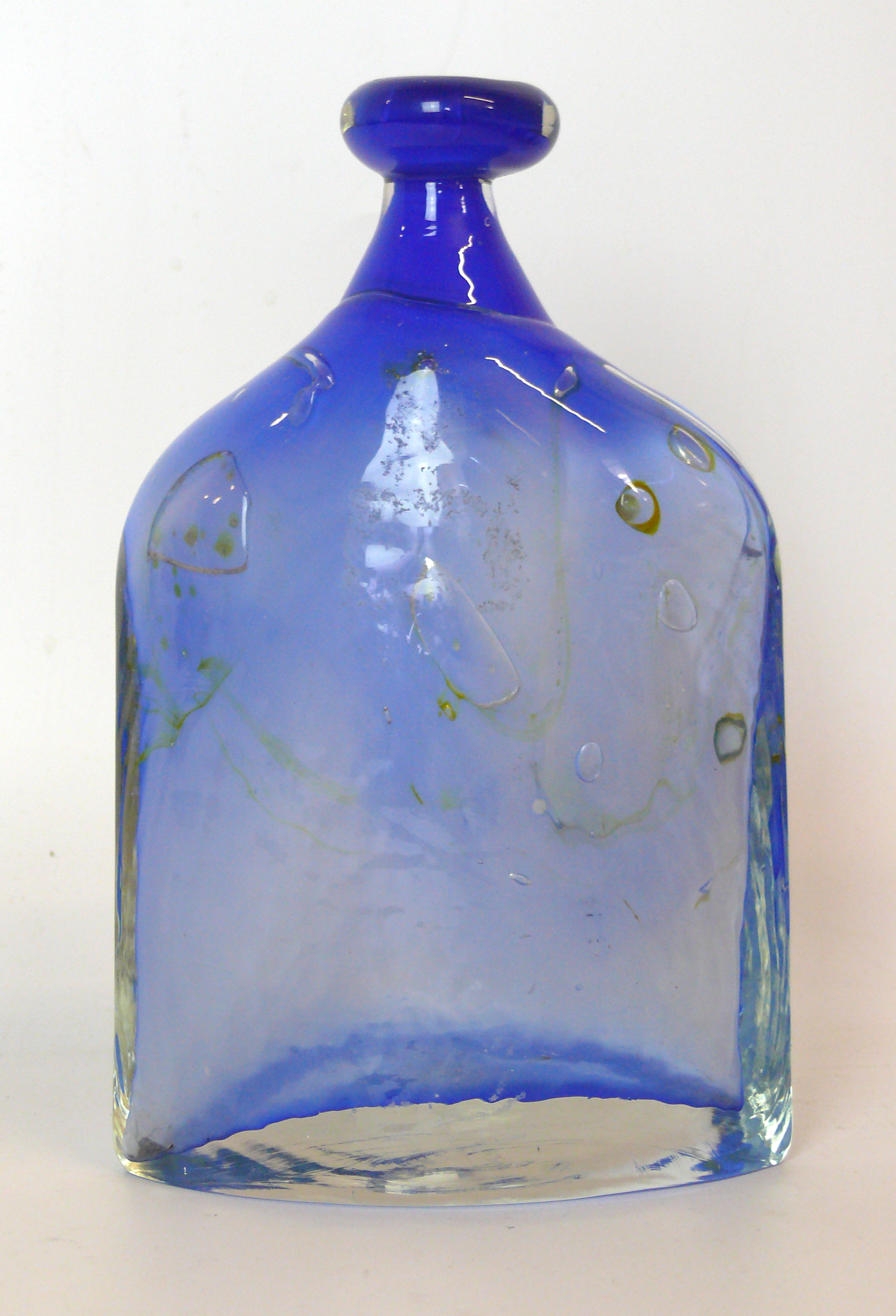 A contemporary studio glass vase in the manner of Kosta Boda Having blue and yellow internal air