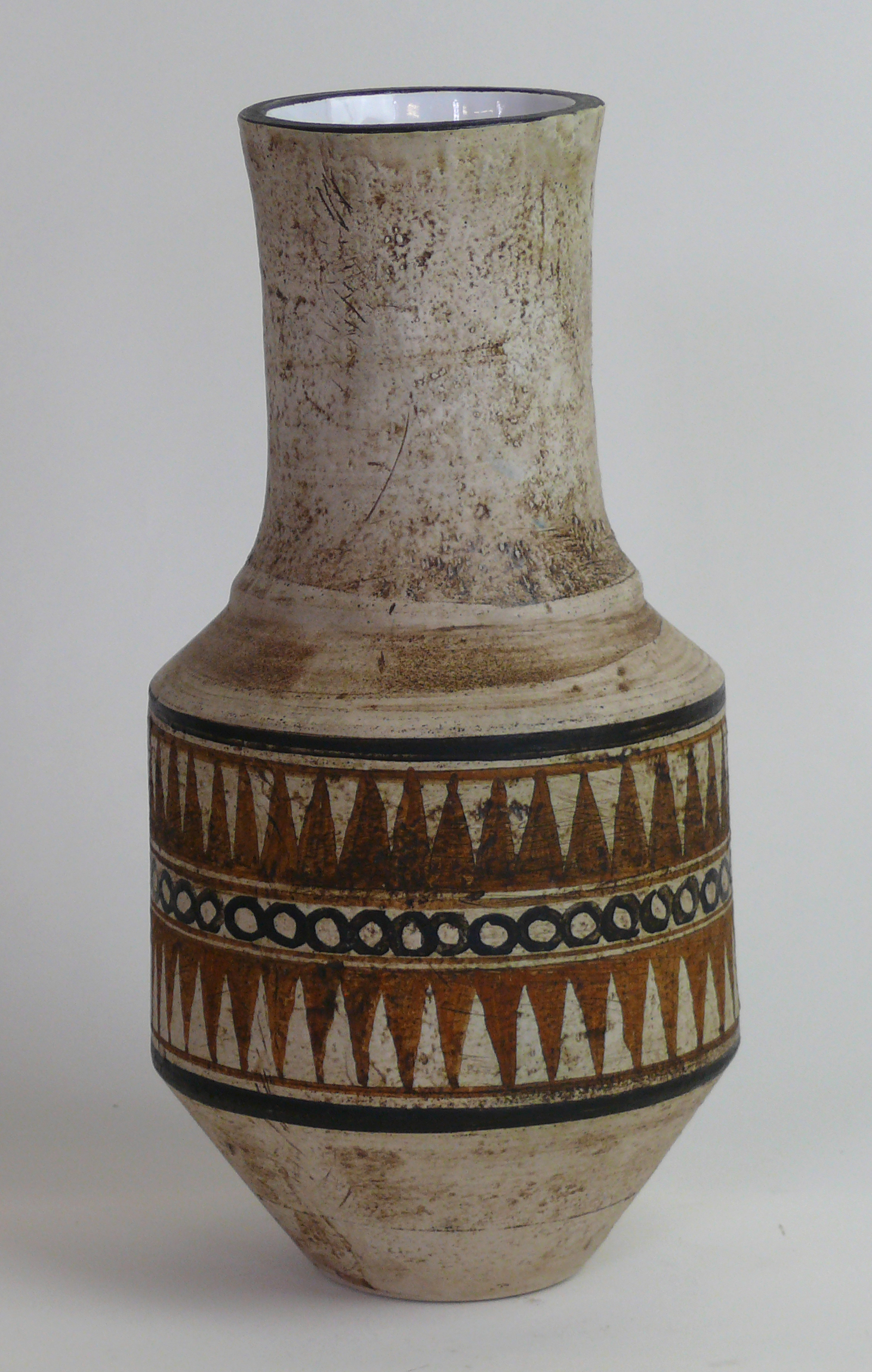 A Troika St Ives pottery 'Urn' vase Having painted shark tooth decoration on a manganese ground,