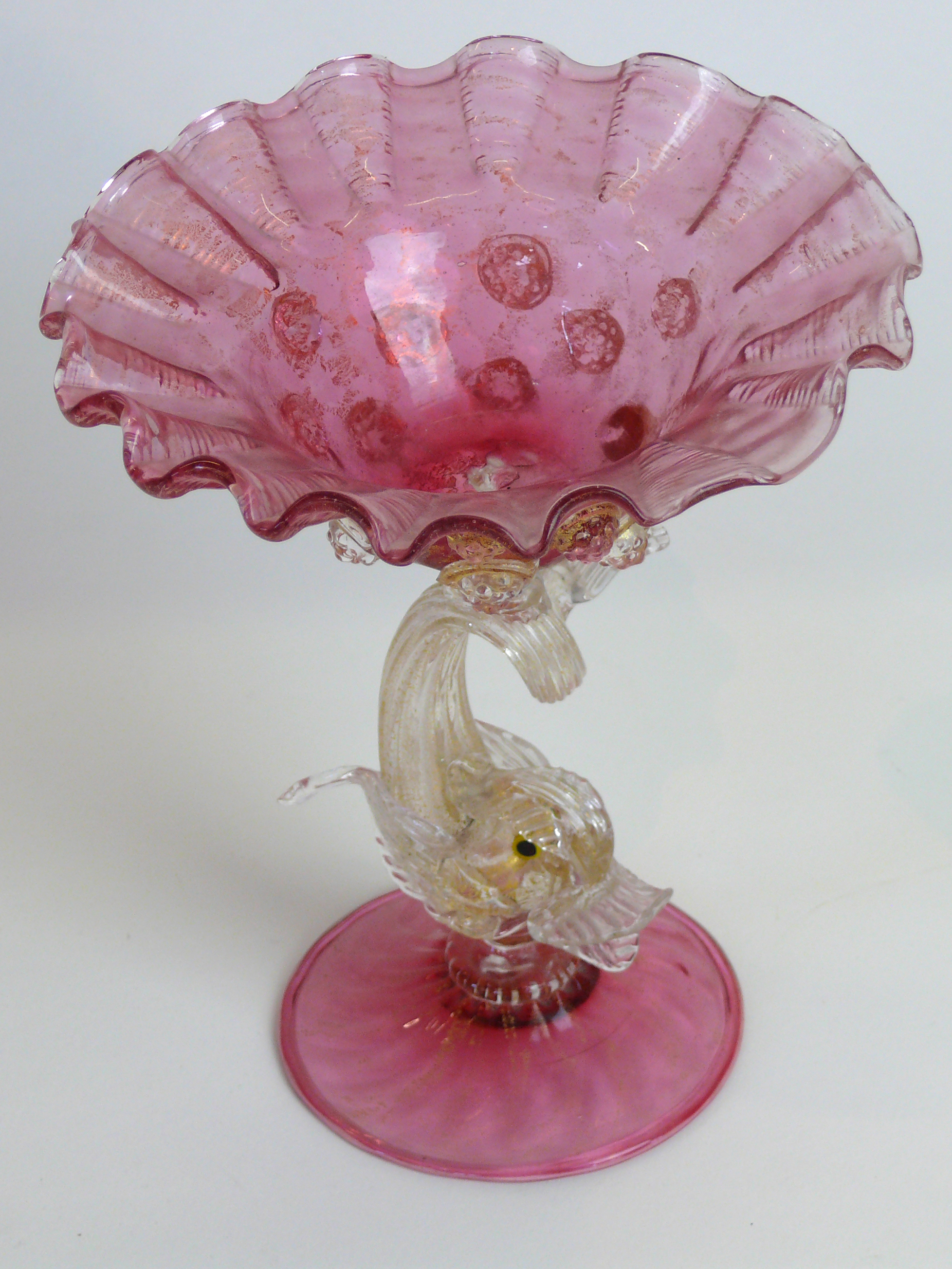 A Murano glass bowl with dolphin support Modelled in the form of a cranberry glass bowl with gilt