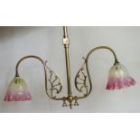 An Arts & Crafts hanging ceiling lamp Having pierced floral decoration,