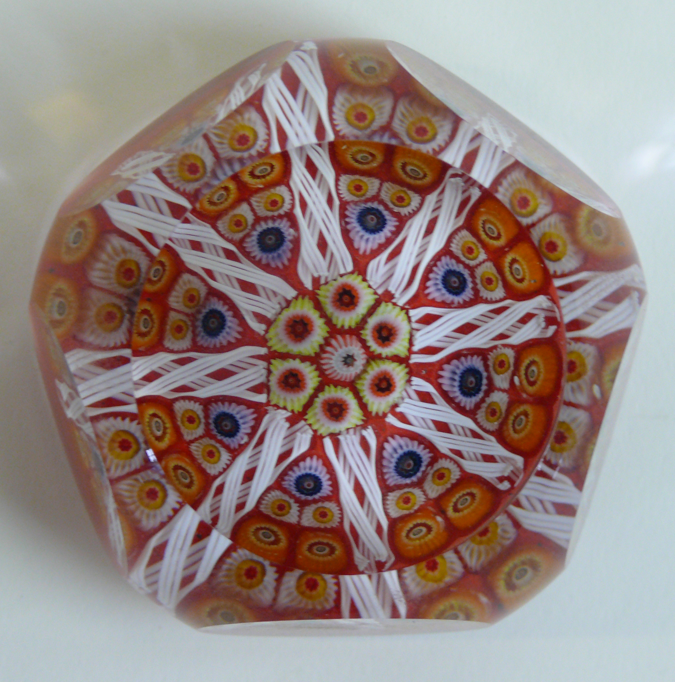 A Strathearn Scottish glass paperweight Having multi faced decoration,