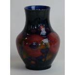 A Walter Moorcroft vase of baluster form Decorated in the 'Pomegranate' pattern,