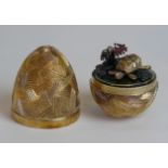 A Stuart Devlin hallmarked silver gilt limited edition novelty egg The cover lifts to enclose a