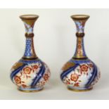 A pair of James Macintyre & Co vases of baluster form with flared necks Decorated in the 'Aurelian'