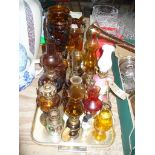 A Collection of Victorian amber glass and other assorted oil lamps to a tray ( approx.