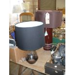 A Cylindrical ceramic table lamp and a glass bottle shaped table lamp c/w shades (2)