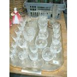 A tray of cut glass table wares wines, liquor glasses and tumblers.