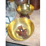 2 Chinese brass bowls with chased dragon decoration and two hardwood folding stands.