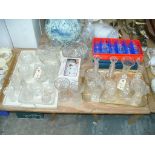 A quantity of cut glassware including water jugs, fruit bowls, rose bowl, dressing table items,