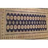 Caucasian rug on a mainly beige ground,