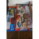 Two Lego sets to include 8487 Disney Cars, 7939 Lego City.