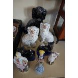 A mixed lot of assorted 19th Century and later Staffordshire to include a spaniels, pepperette,