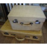 Two vintage pig skin travelling trunks.