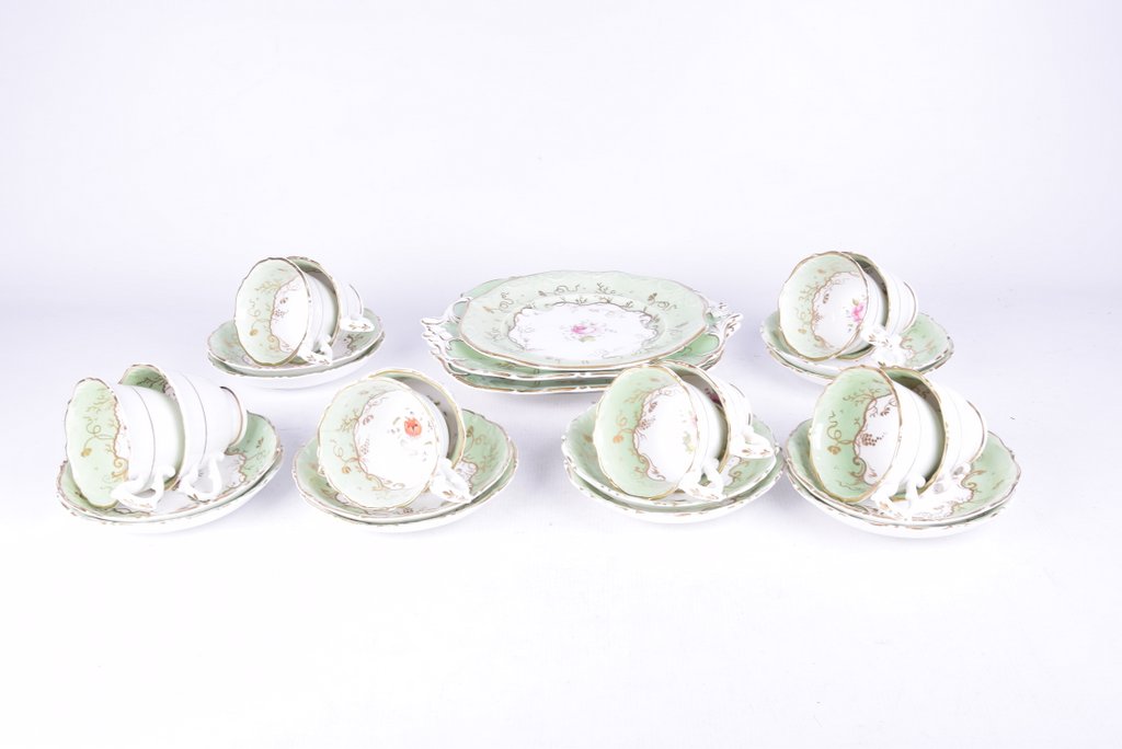 A Late 19th Century English porcelain tea service Comprising twelve teacups, twelve saucers,