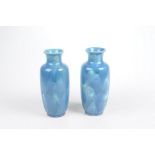 A pair of Minton & Hollins reactive glaze vases Each of ovoid form with flared rim,