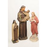 A Collection of three religious devotional icons To include a parian and glazed figure of 'The