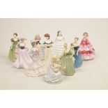 A collection of Royal Doulton and Coalport figures To include Royal Doulton examples Susan HN2952