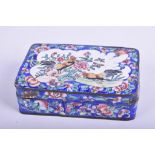 A Chinese Qianlong style enamelled lidded box Of rectangular form with frilled cover,