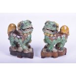 A pair of Chinese Sancai glazed lion dogs,