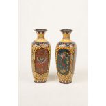 A pair of Japanese early 20th Century Cloisonné vases Each of rounded square section,