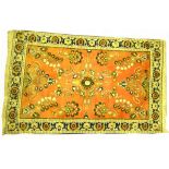 A Bokhara style rug Of rectangular form with tasselled edging,