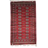 A modern Bokhara style rug Of typical rectangular form,