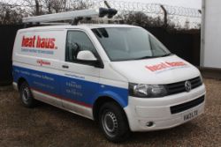 A Fleet of 5 Volkswagen Vans and A Peugeot Van