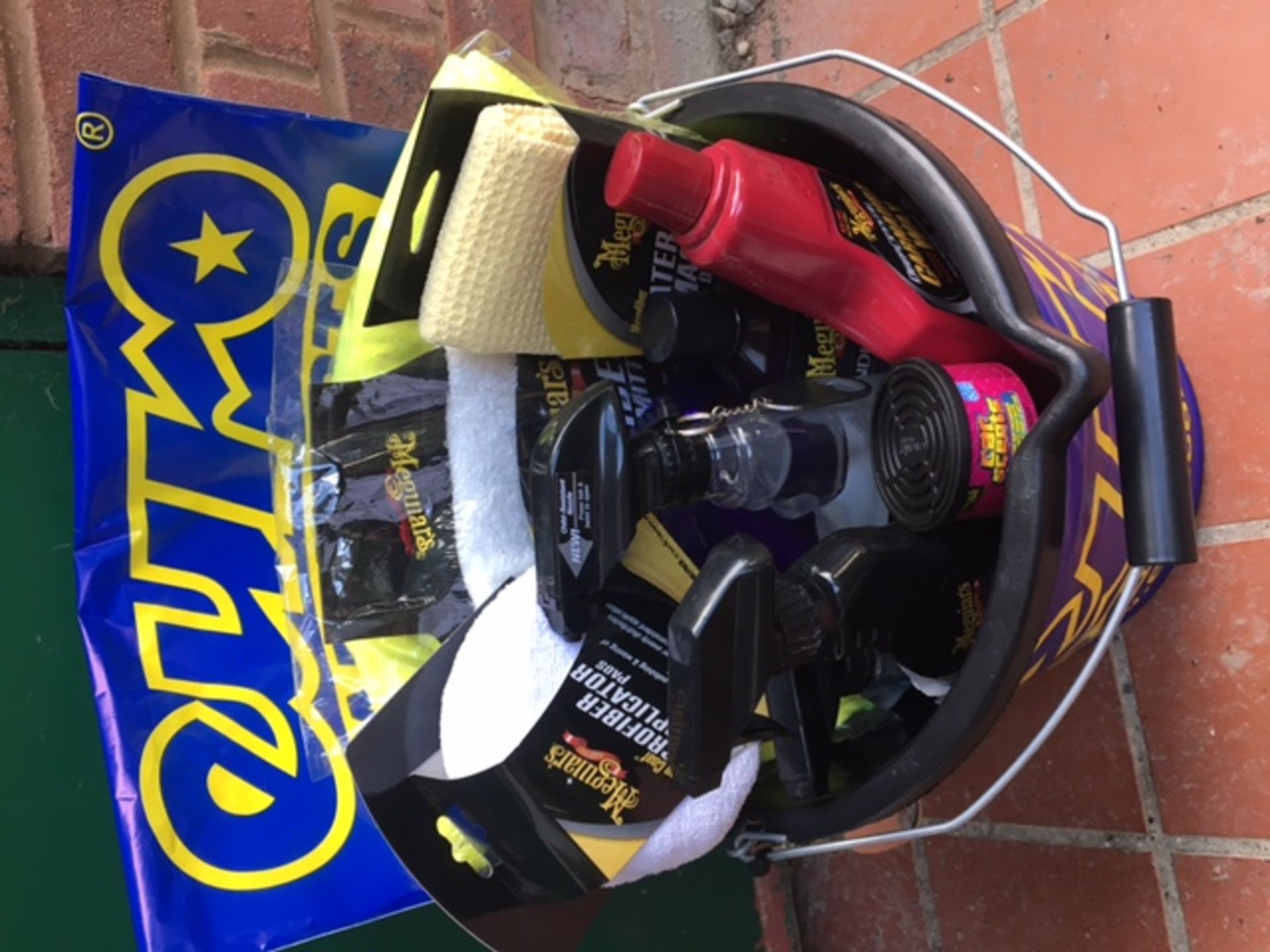 Car cleaning bucket: Meguiars mega cleaning bucket. Worth £130.00, consists of - Glass cleaner, Tyre