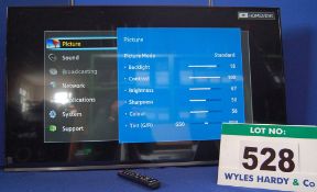 A SAMSUNG 48 inch Wide/Flat Screen Television with Hand Held Remote Control (No Stand or Wall