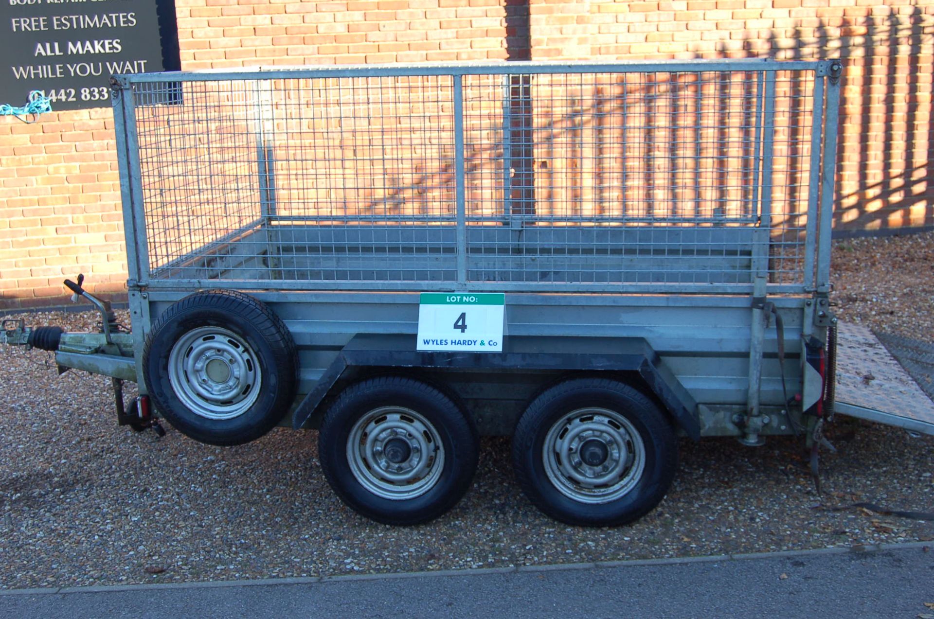 An INDESPENSION 2700Kg capacity Twin Axle Plant Trailer with Approx. 2.5M x 1.5M Bed, Triple Lock