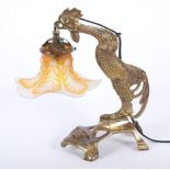 JUGENDSTIL-TISCHLAMPE "HAHN", Messing, patiniert, Schirm aus farblosem Glas, orange überfangen, H