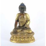 BUDDHA SHAKYAMUNI, Bronze, teilweise feuervergoldet, auf einem doppelten Lotosthron sitzend,